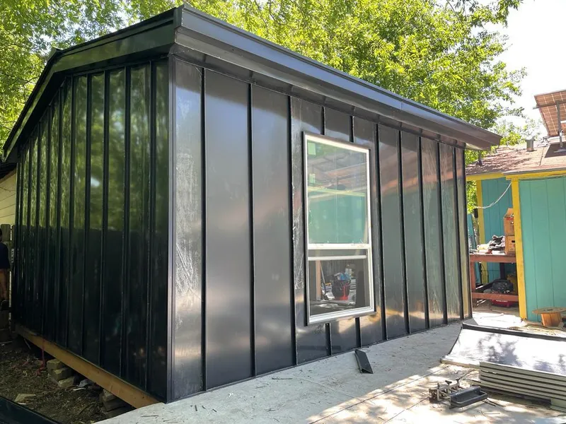 Black standing seam metal wall panels for Roof Inspection in North Weeki Wachee