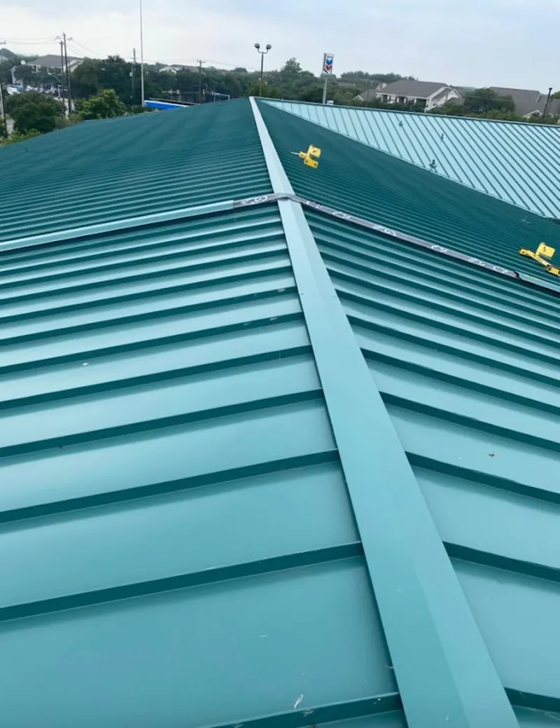 Green commercial metal roof ridge and valley for Metal Roof Repair in North Weeki Wachee