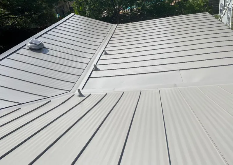 Solar attic fan installed on a metal roof for Roof Ventilation in North Weeki Wachee